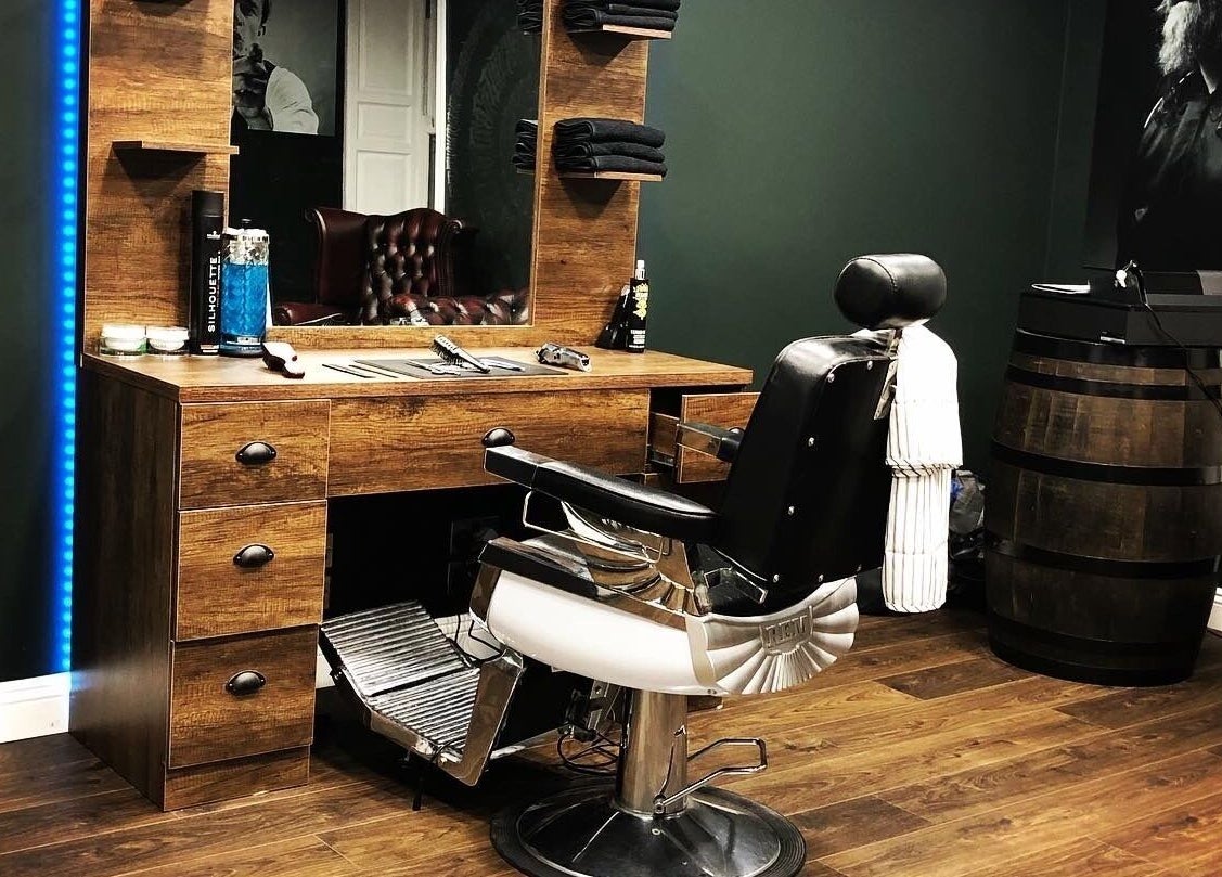 Classic barber chair at The Local - Paul Merrilees Gentleman’s barber, west, England, GB.