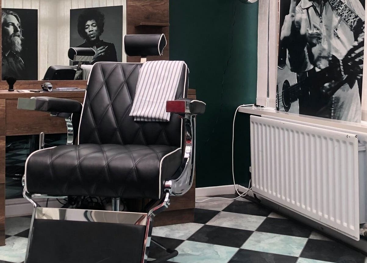 Classic barber chair at The Local - Paul Merrilees Gentleman’s barber, west, England, GB with vintage decor.