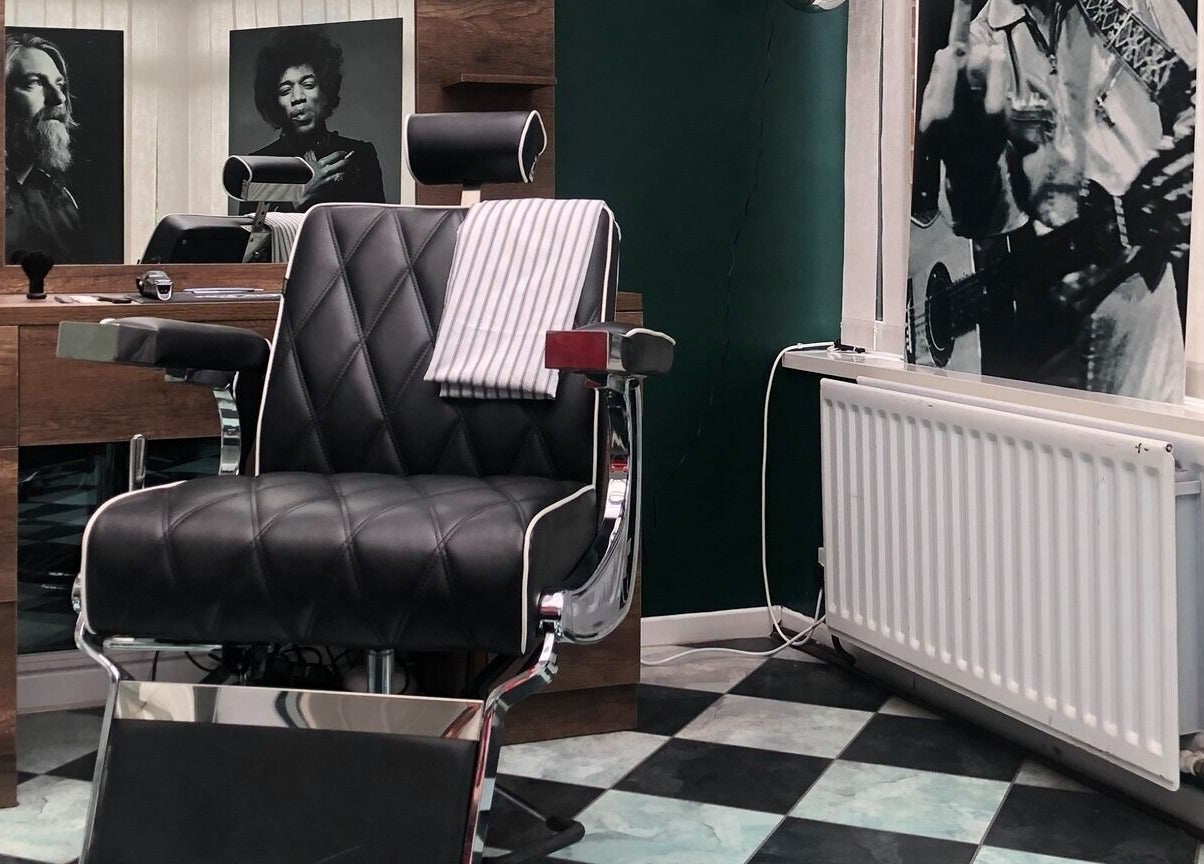 Classic barber chair at The Local - Paul Merrilees Gentleman’s barber, west, England, GB with vintage decor.