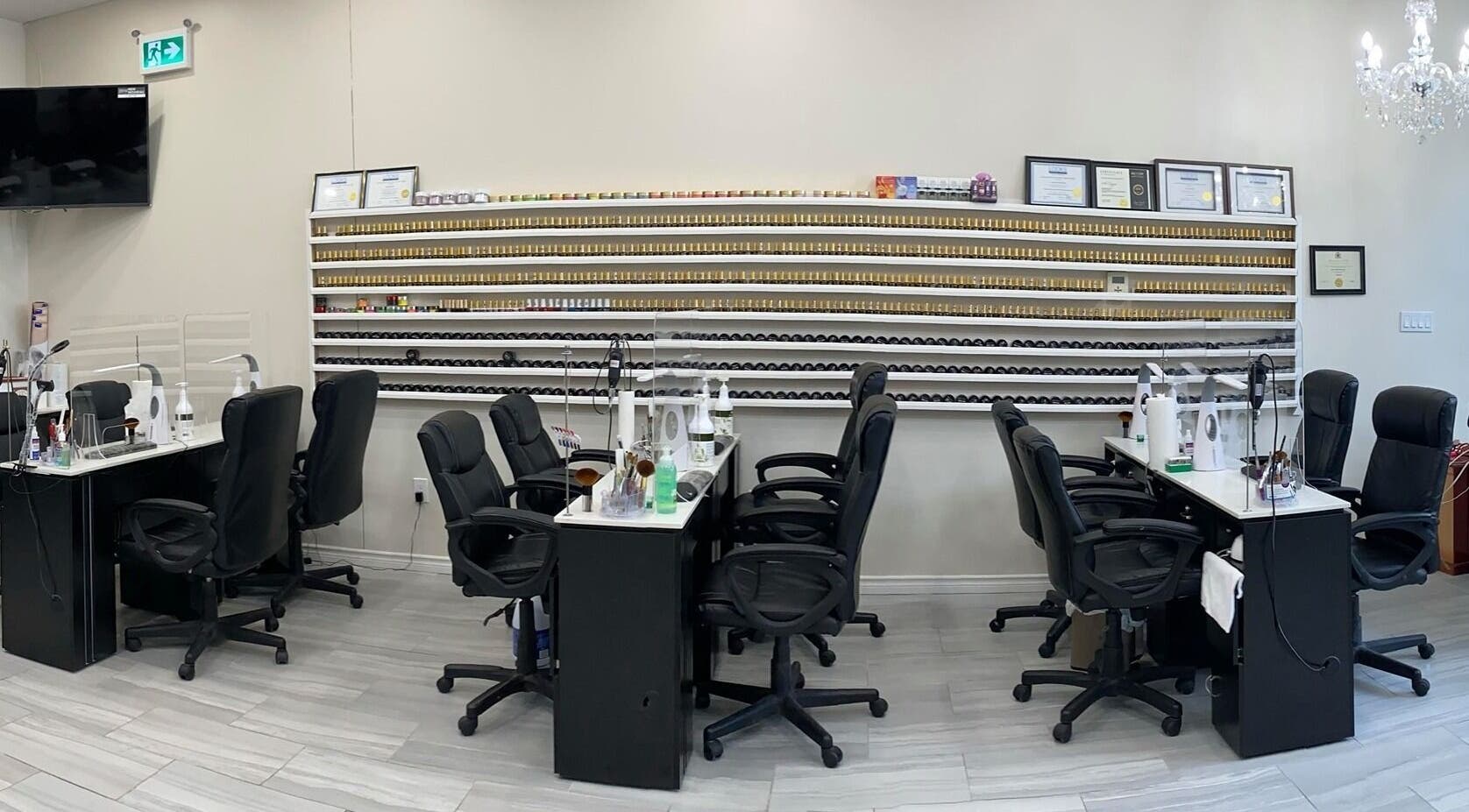 Elegant nail salon interior at Glorious Nails and Spa, Ottawa, Ontario, CA featuring polished workstations.