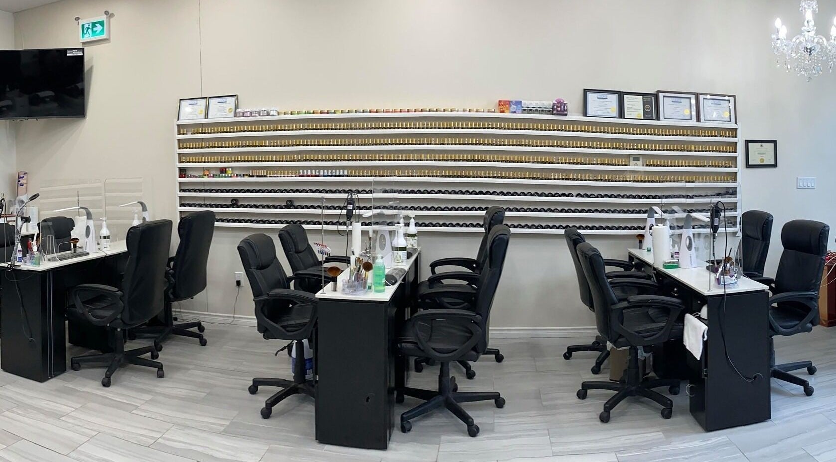 Elegant nail salon interior at Glorious Nails and Spa, Ottawa, Ontario, CA featuring polished workstations.