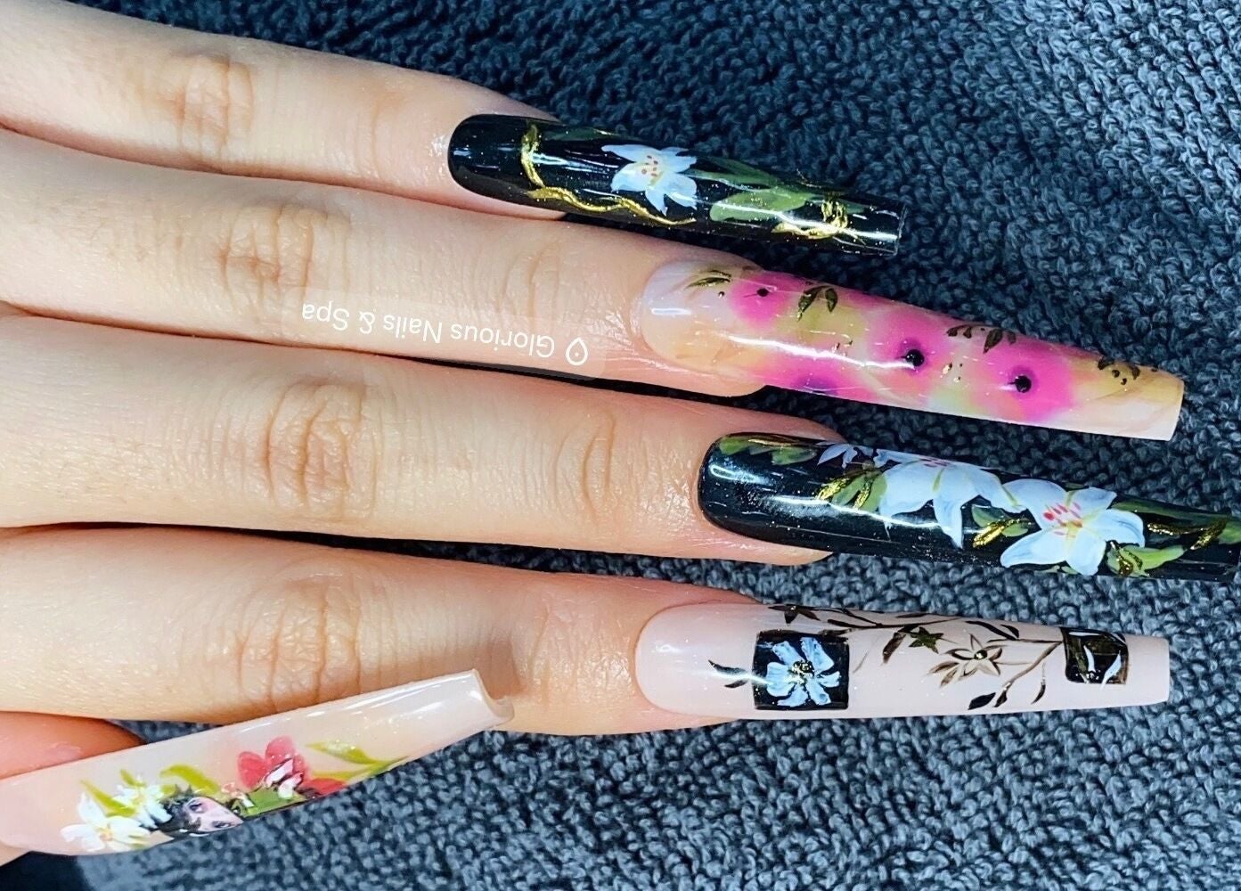 Elegant floral nail art by Glorious Nails and Spa in Ottawa, Ontario, CA, showcasing intricate designs and vibrant colors.