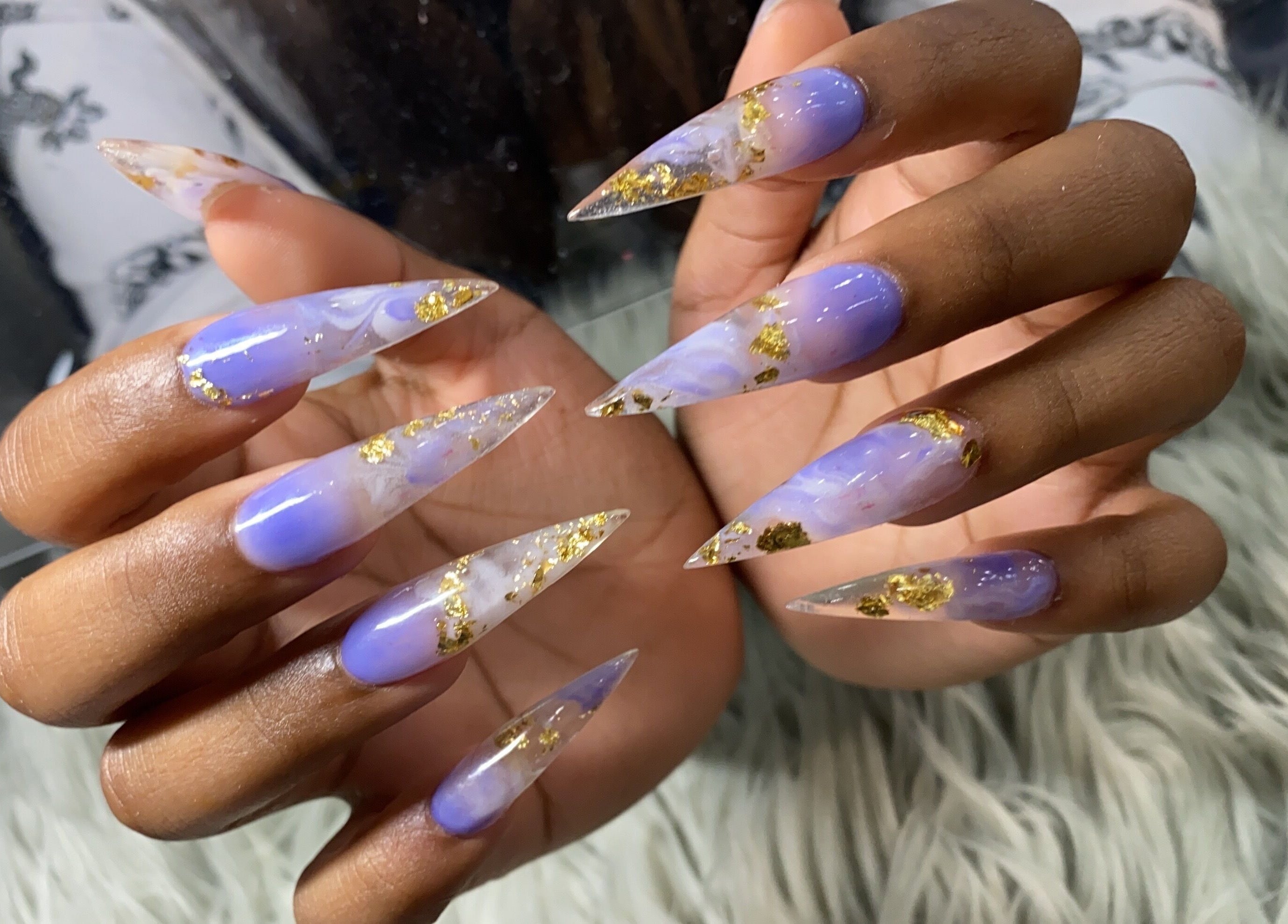 Elegant purple marble nails with gold flakes at Glorious Nails and Spa, Ottawa, Ontario, CA.