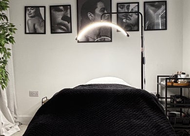 Relaxing treatment room at Sunday Rose in Shadoxhurst, England, GB with soft lighting and decor.