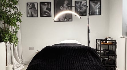 Relaxing treatment room at Sunday Rose in Shadoxhurst, England, GB with soft lighting and decor.