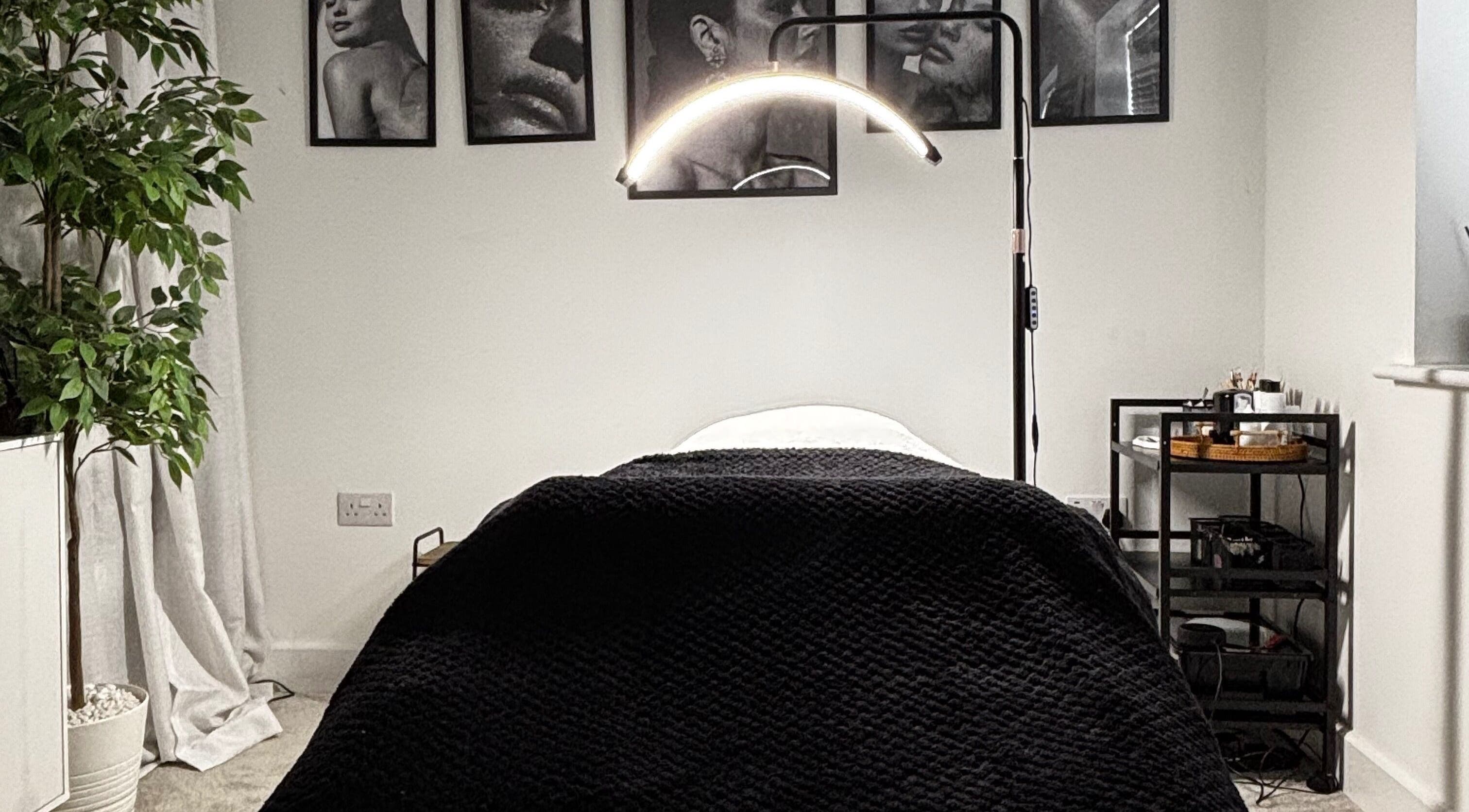 Modern treatment room at Sunday Rose, Shadoxhurst, England, GB, featuring a cozy bed and serene decor.