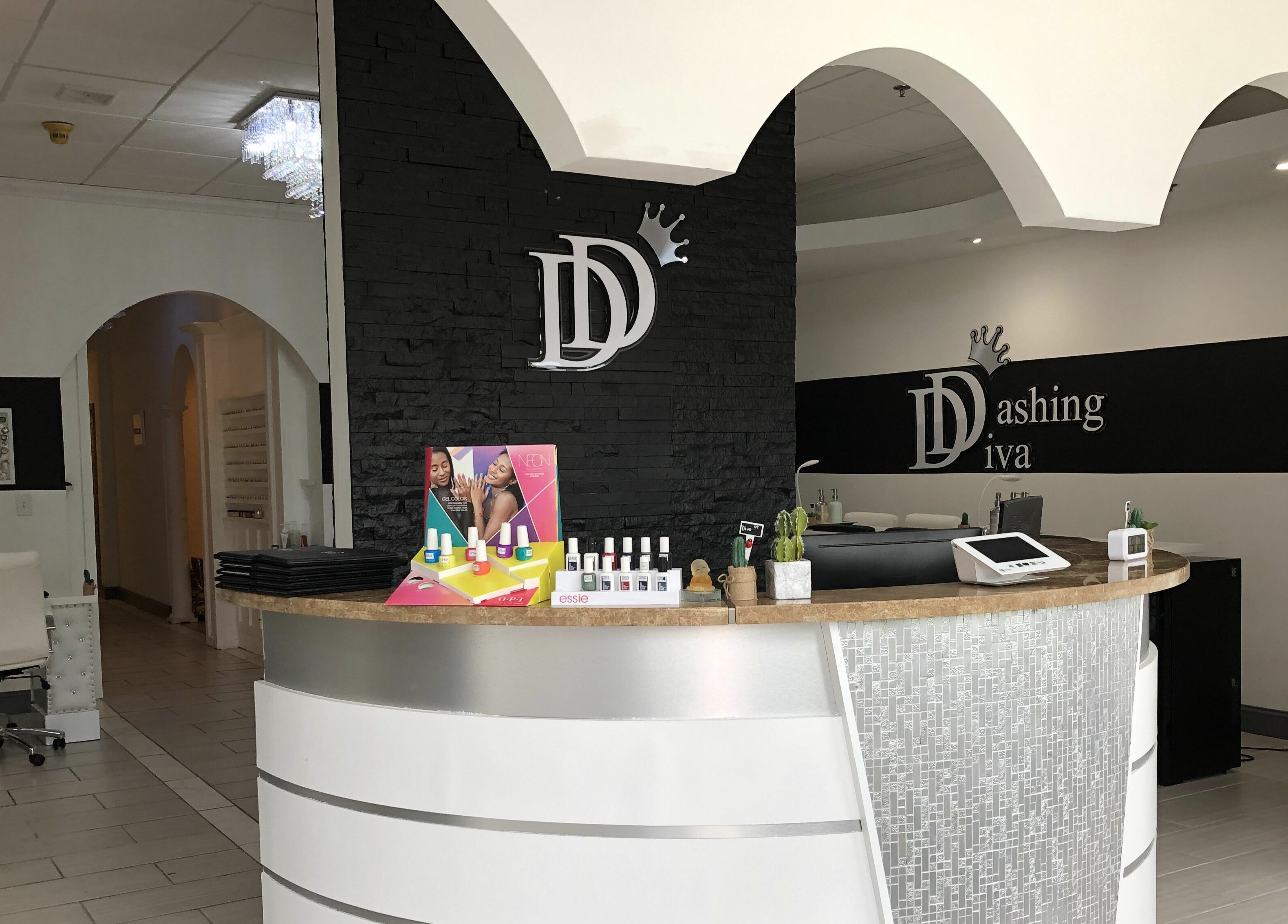 Elegant reception area at Dashing Diva Nails and Spa, Swampscott, Massachusetts, US showcasing a modern design.