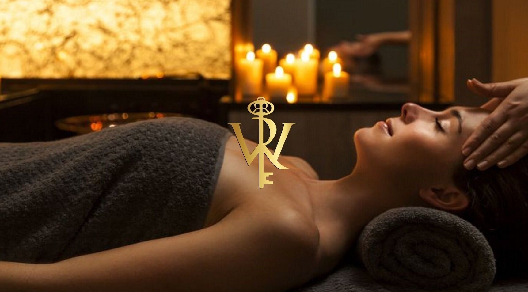 Relaxing massage at Revive the Key to Wellness, Scotland, GB with soothing candlelight ambiance.