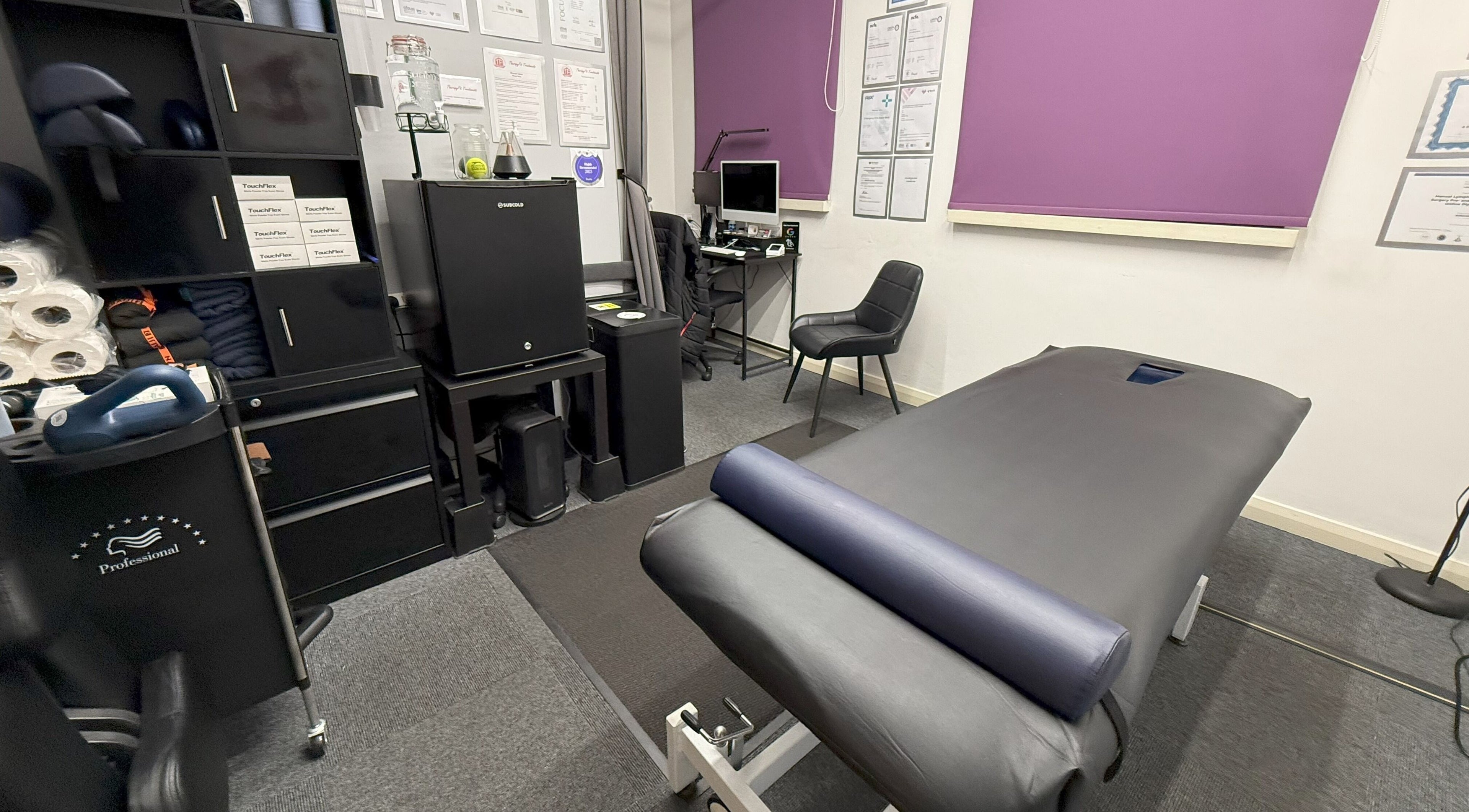 TherapyFit Treatments massage room with professional equipment in Birmingham, England, GB.