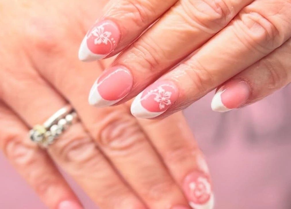 Close-up of floral nail art at Mia's Beauty Bar, Earl Shilton, England, GB.