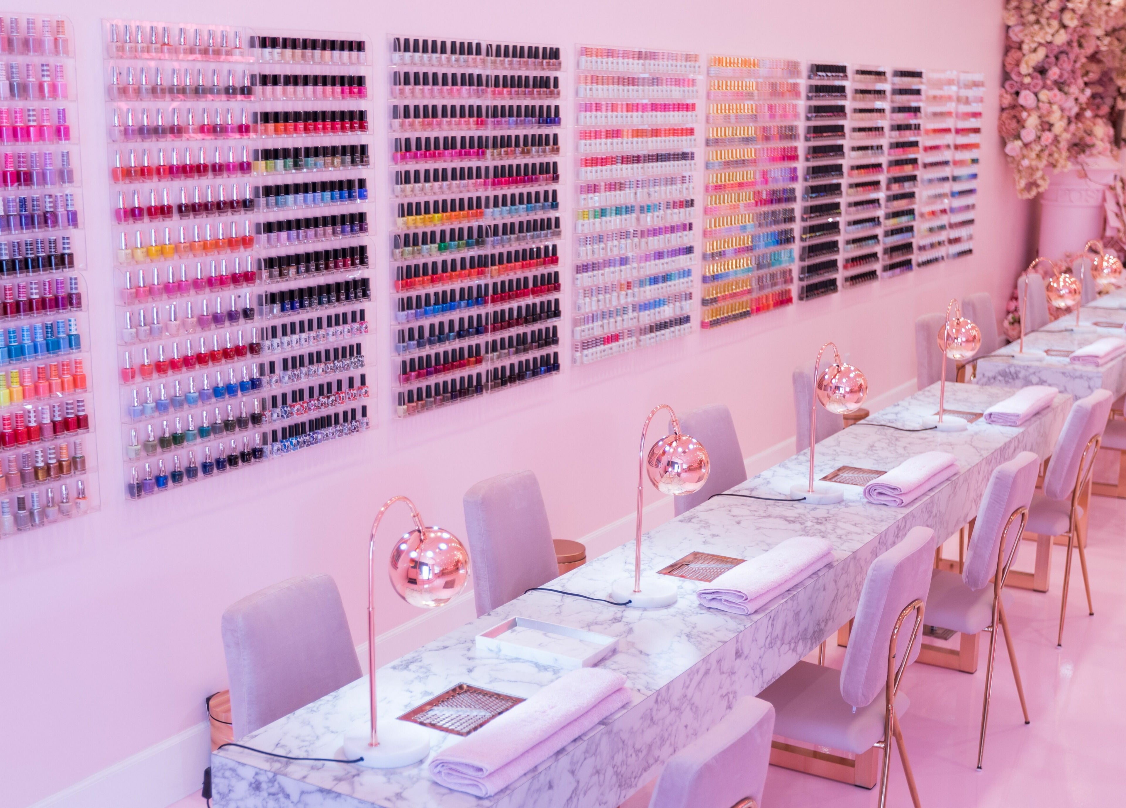 Stunning nail polish display and chic seating at Nail'd It London, Glendale, California, US.