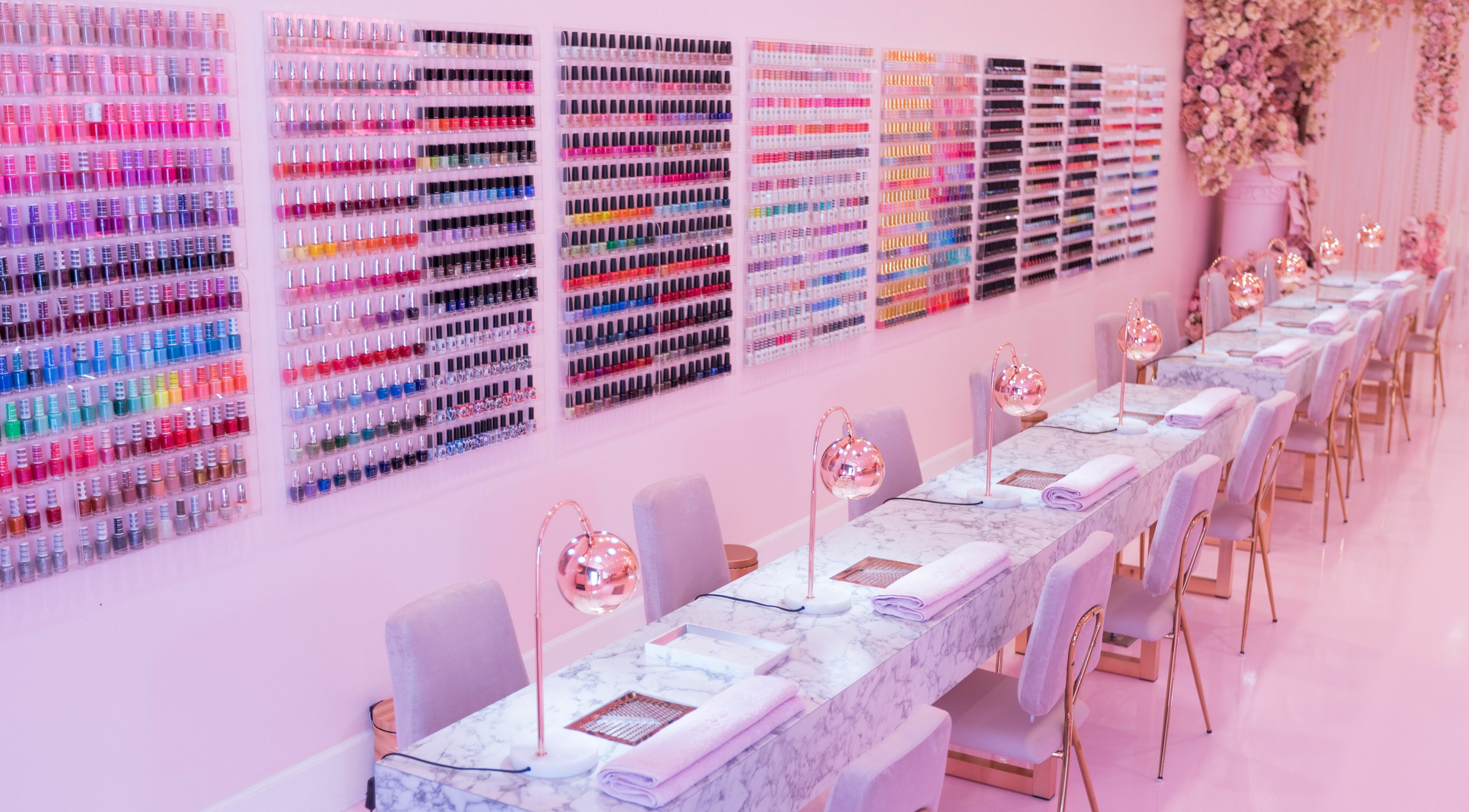 Stunning nail polish display and chic seating at Nail'd It London, Glendale, California, US.