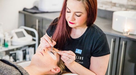 Hayley Hicks - Beauty Specialist applying eyelash extensions in Malmesbury, England, GB.