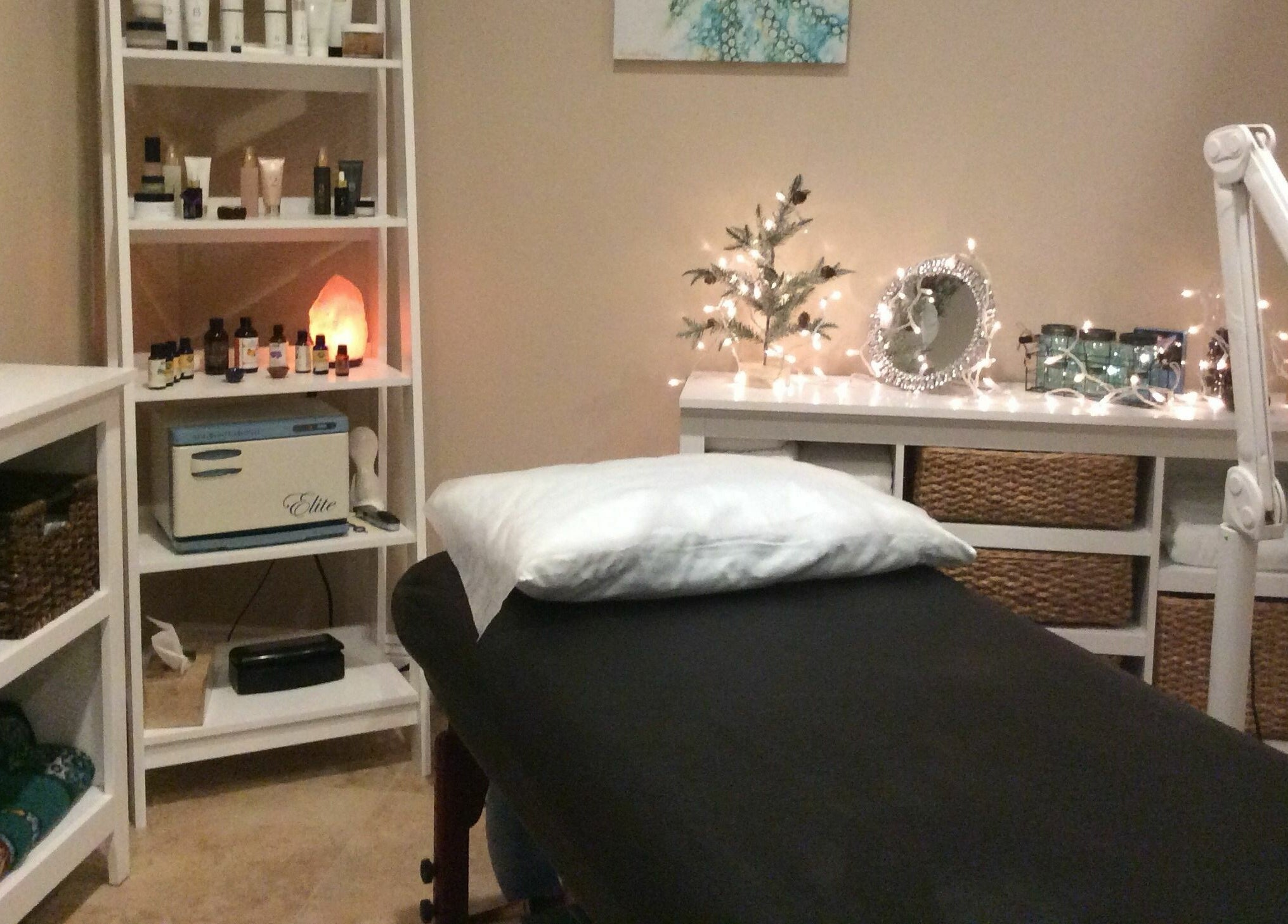 Cozy massage room at Sugar Maui in Kihei, Hawaii, US with comfy bed and ambient lighting.