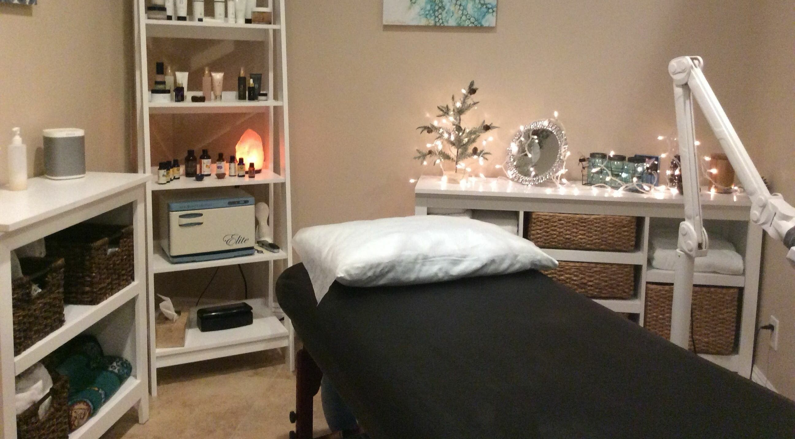 Cozy massage room at Sugar Maui in Kihei, Hawaii, US with comfy bed and ambient lighting.