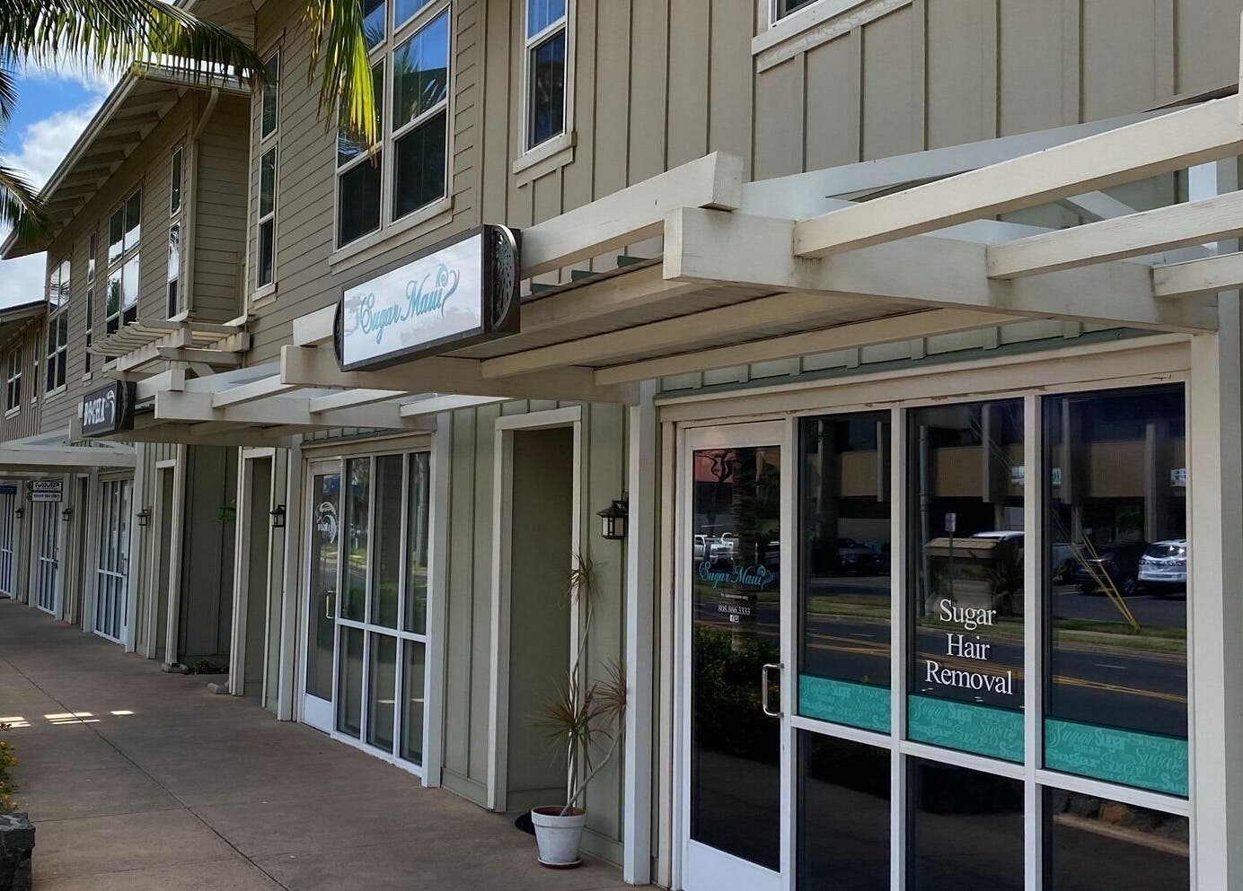 Front view of Sugar Maui beauty venue located in Kihei, Hawaii, US, showcasing its inviting entrance.