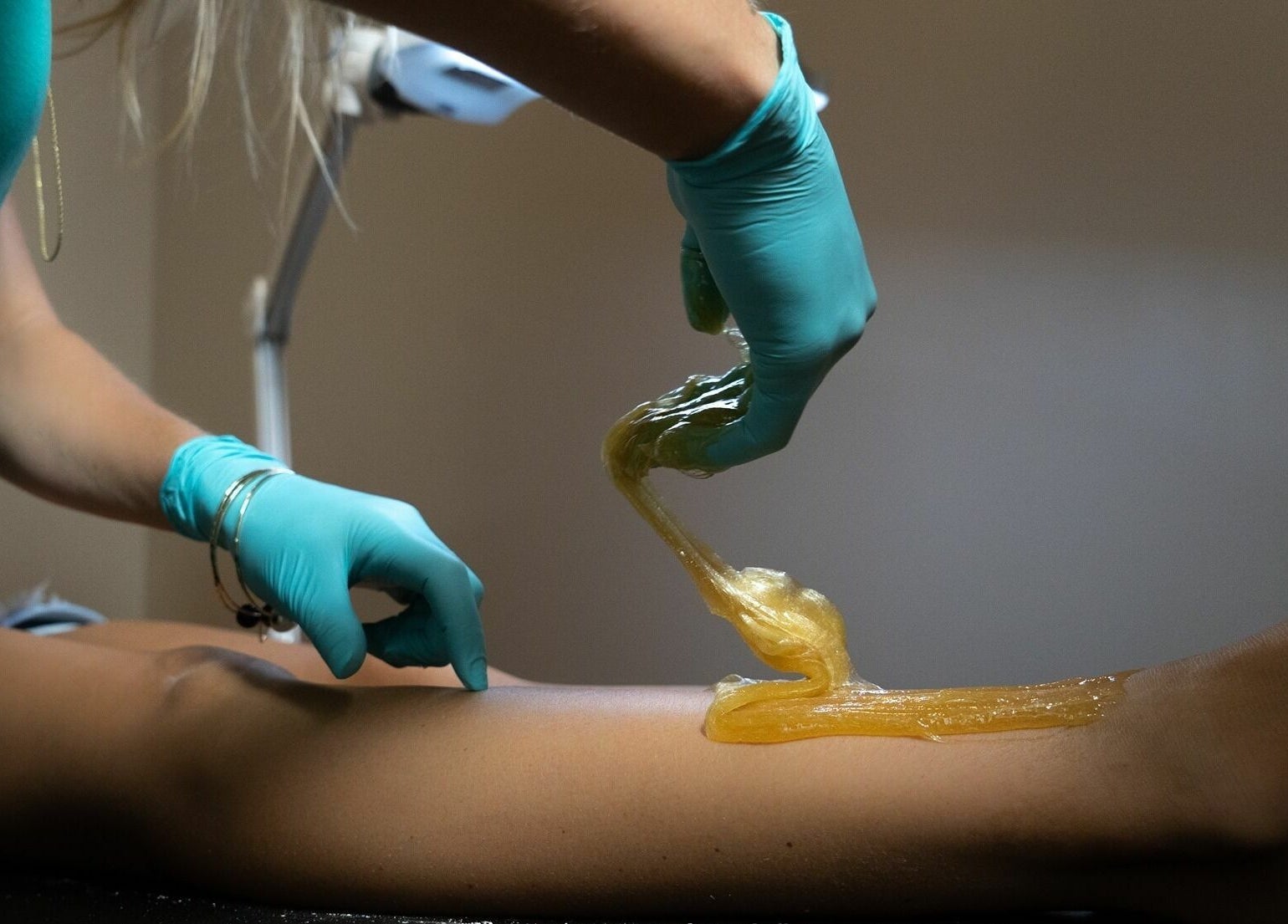 Professional sugaring treatment at Sugar Maui in Kihei, Hawaii, US for smooth, flawless skin.