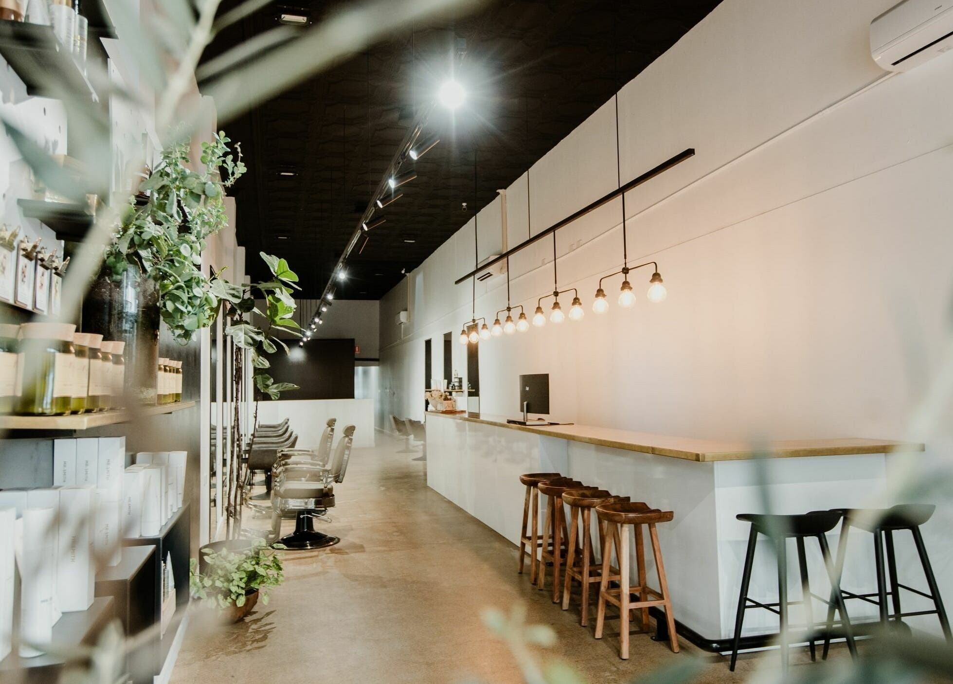 Elegant interior at Tribecca & Co., Tamworth, New South Wales, AU, showcasing modern decor and seating.