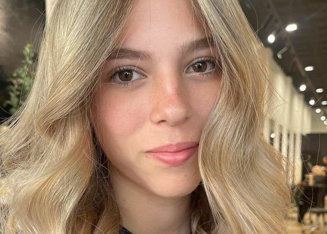 Elegant hairstyle at Tribecca & Co., Tamworth, New South Wales, AU, showcasing blonde curls.