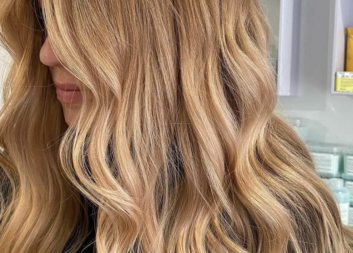 Flowing golden waves hairstyle at Tribecca & Co., Tamworth, New South Wales, AU.