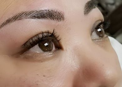 Close-up of expertly shaped brows and lashes at Lash n Brow by KT, Long Island City, New York, US.