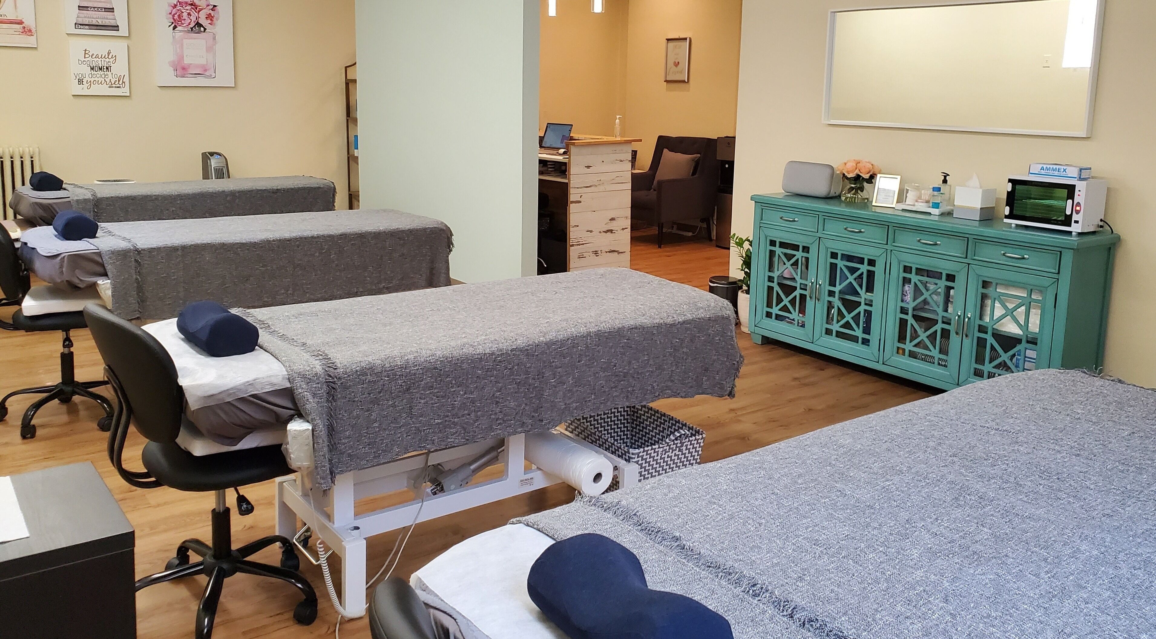 Stylish treatment room at Lash n Brow by KT, Long Island City, New York, US with plush massage tables.