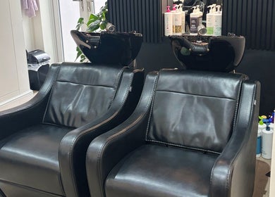 Comfortable salon chairs at Belle Amour, Bagshot, England, GB, ideal for relaxing beauty treatments.