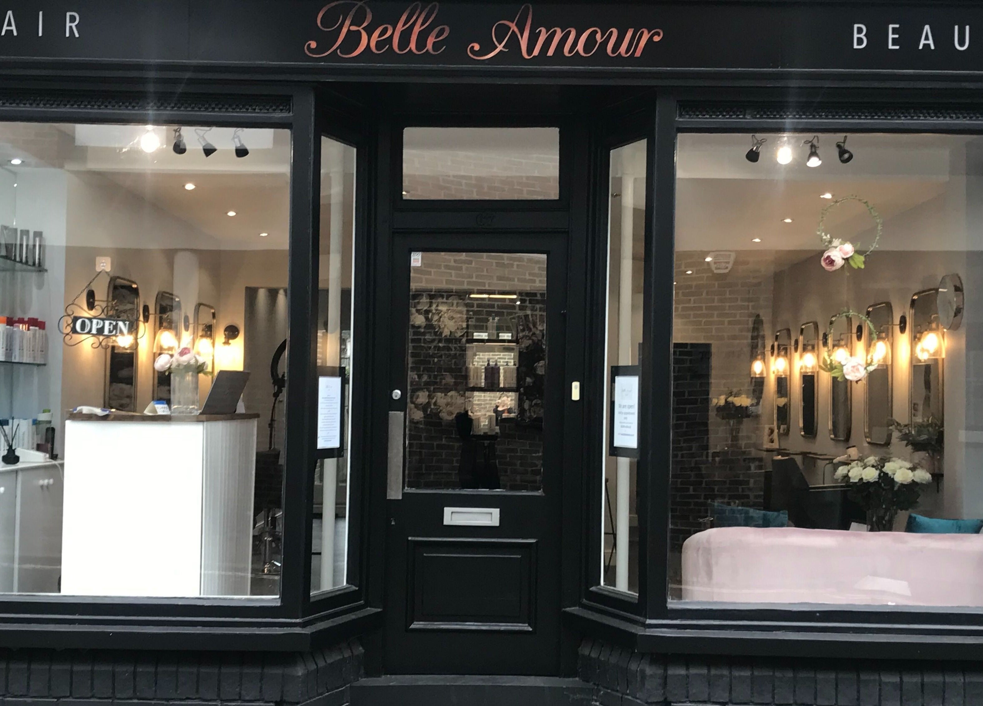 Exterior view of Belle Amour in Bagshot, England showcasing stylish salon interior.