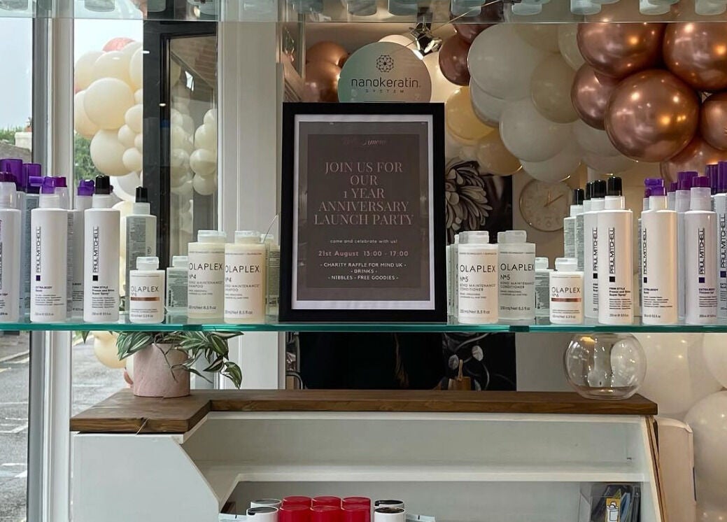 Stylish product display at Belle Amour, Bagshot, England, GB featuring premium haircare brands.