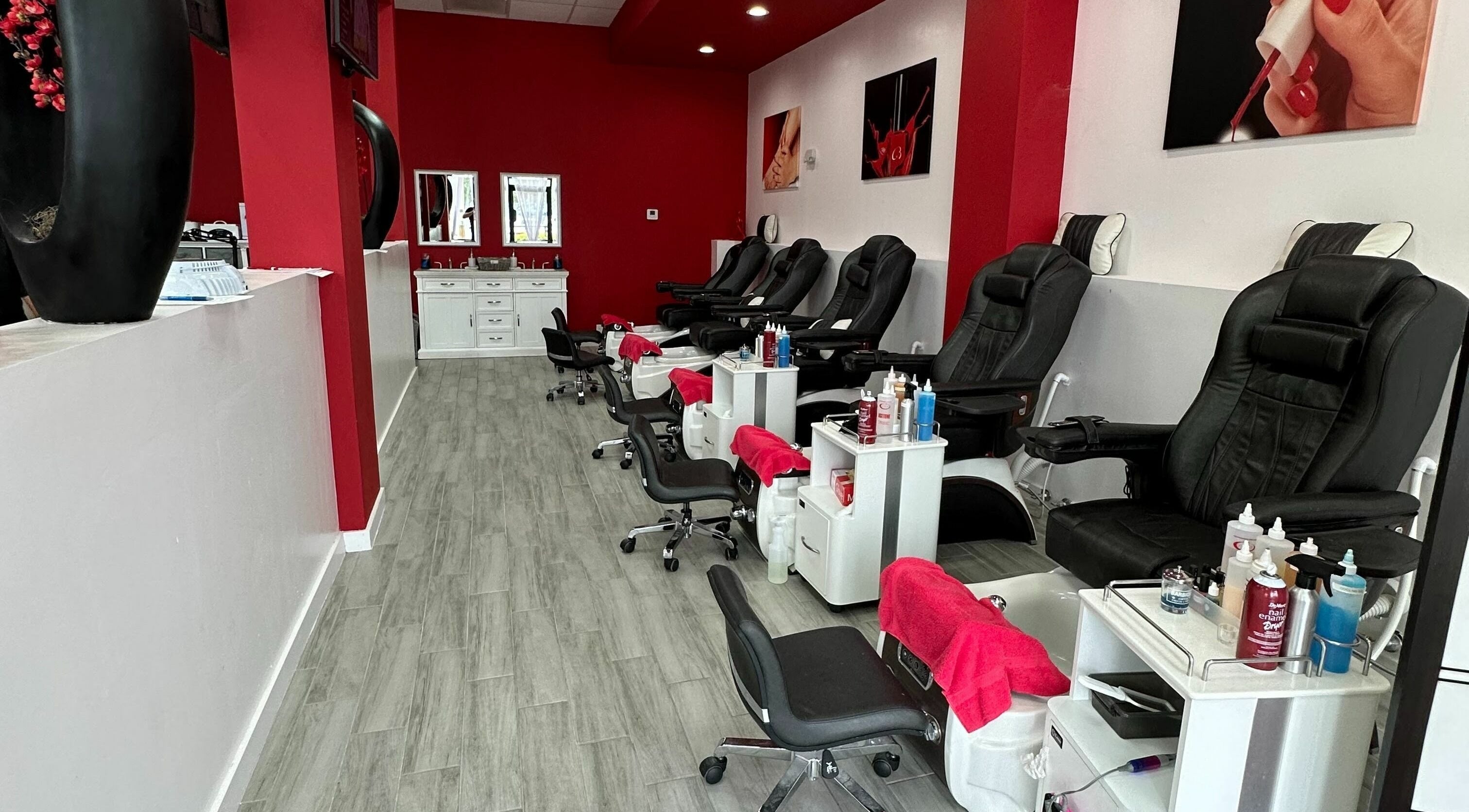 Elegant pedicure chairs at Blossom Nails in Sanford, Florida, US, offering a premium wellness experience.