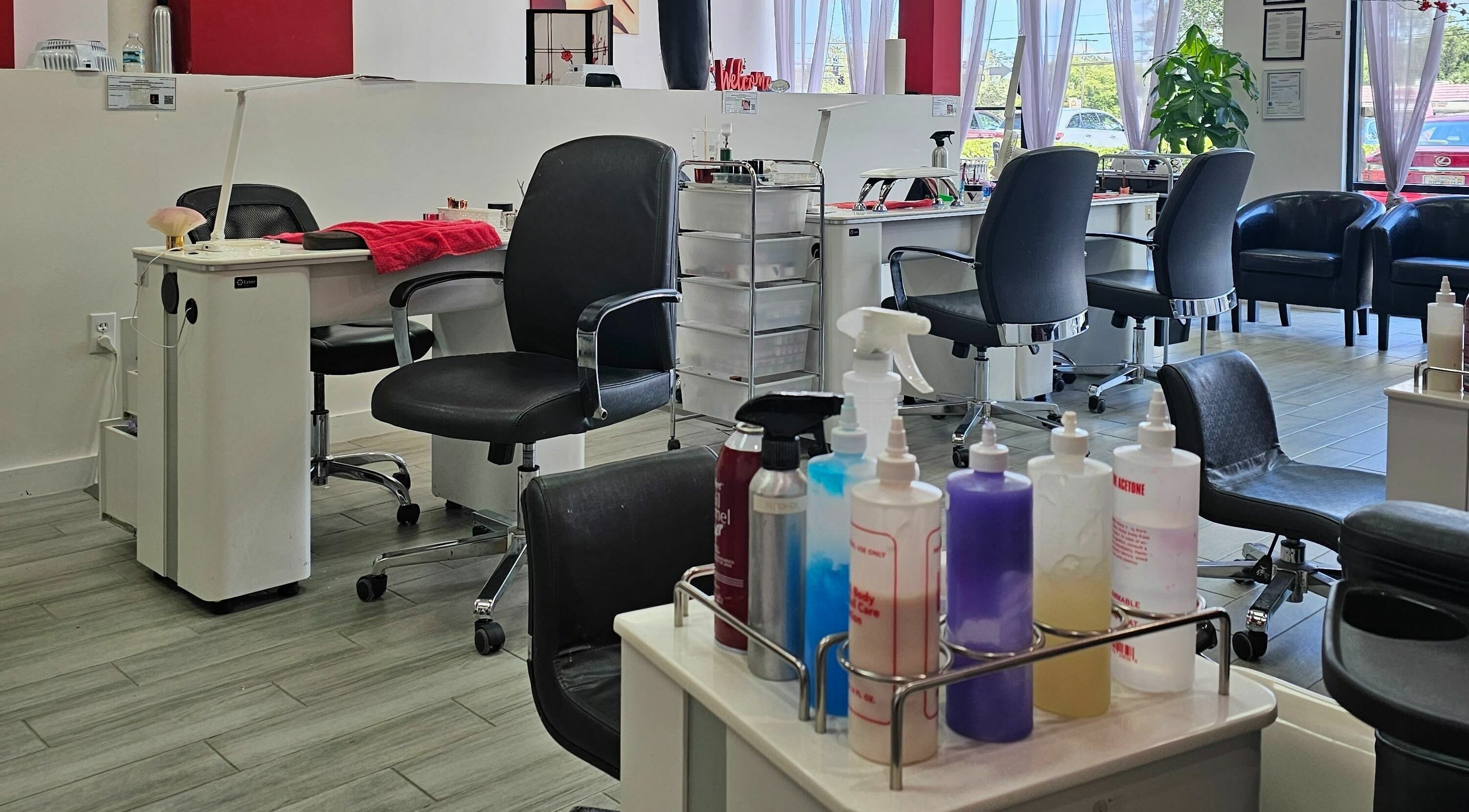 Cozy interior of Blossom Nails in Sanford, Florida, US with comfortable chairs and nail care essentials.