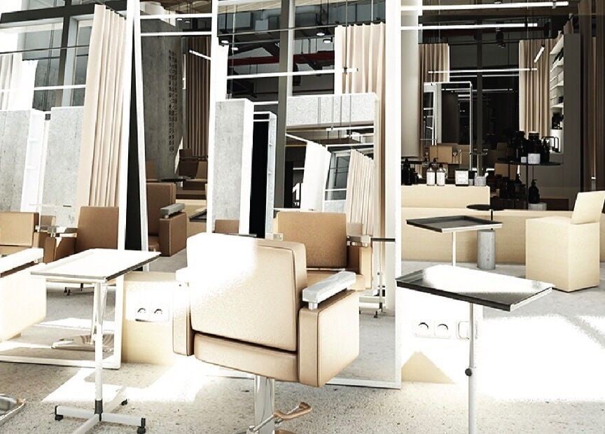 Elegant salon interior at SHIN by AKIENDO in Krung Thep Maha Nakhon, featuring modern beige decor and mirrors.