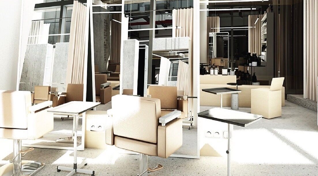 Elegant salon interior at SHIN by AKIENDO in Krung Thep Maha Nakhon, featuring modern beige decor and mirrors.