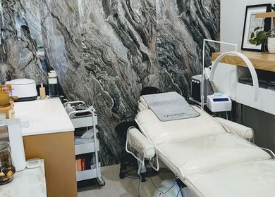 Sophisticated treatment room at QueenSt. Beauty Lounge, Perth, Western Australia, AU featuring modern decor.