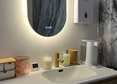 Elegant vanity setup at QueenSt. Beauty Lounge in Perth, Western Australia, AU offering luxurious amenities.