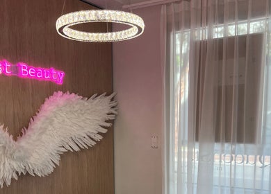 Stylish interior with angel wings at QueenSt. Beauty Lounge, Perth, Western Australia, AU.