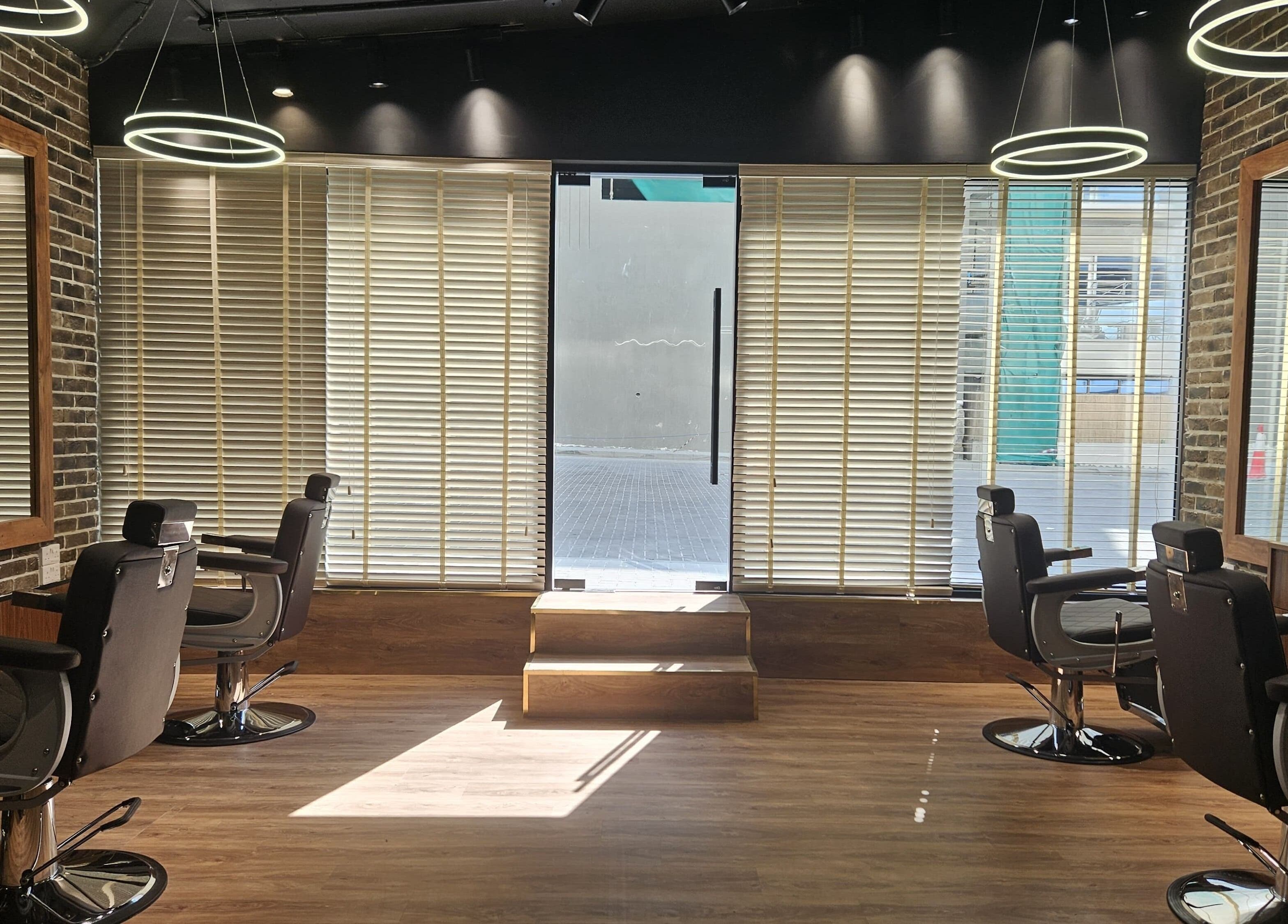 Stylish barber chairs at Peaky Blinders | Five JVC in Dubai, Dubai, AE, offer a modern grooming experience.