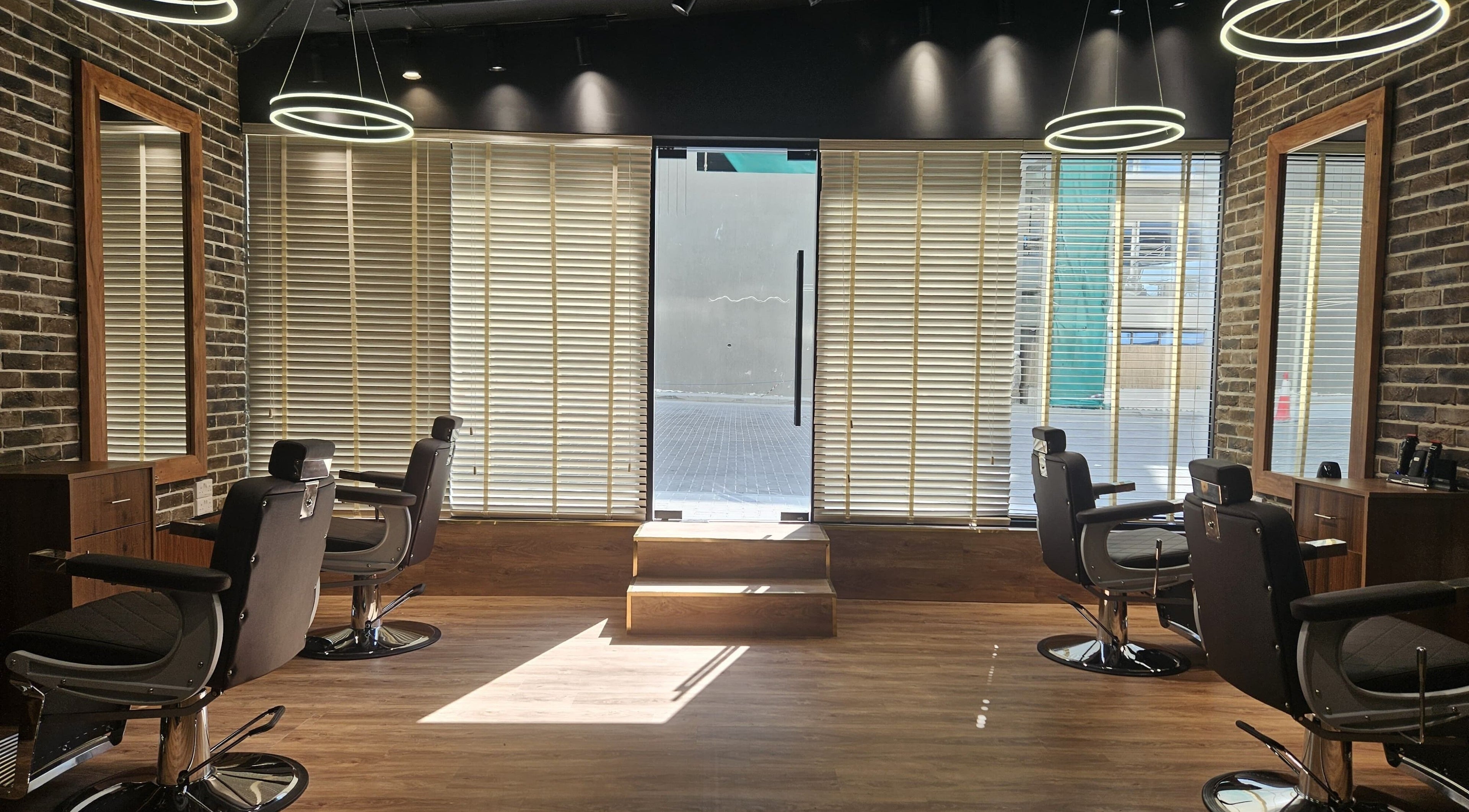 Stylish barber chairs at Peaky Blinders | Five JVC in Dubai, Dubai, AE, offer a modern grooming experience.