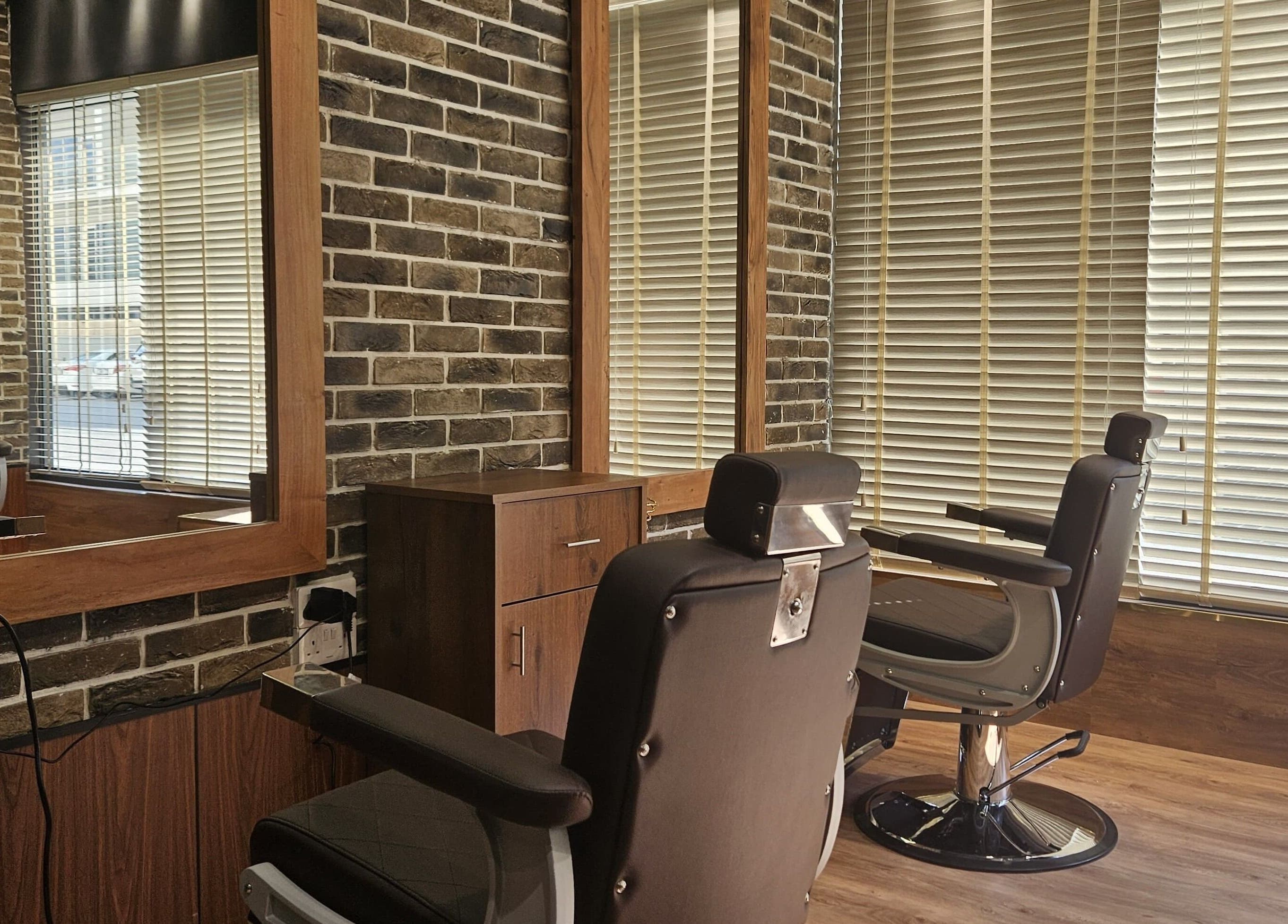 Stylish barber chairs at Peaky Blinders | Five JVC, Dubai, Dubai, AE, offering premium grooming services.