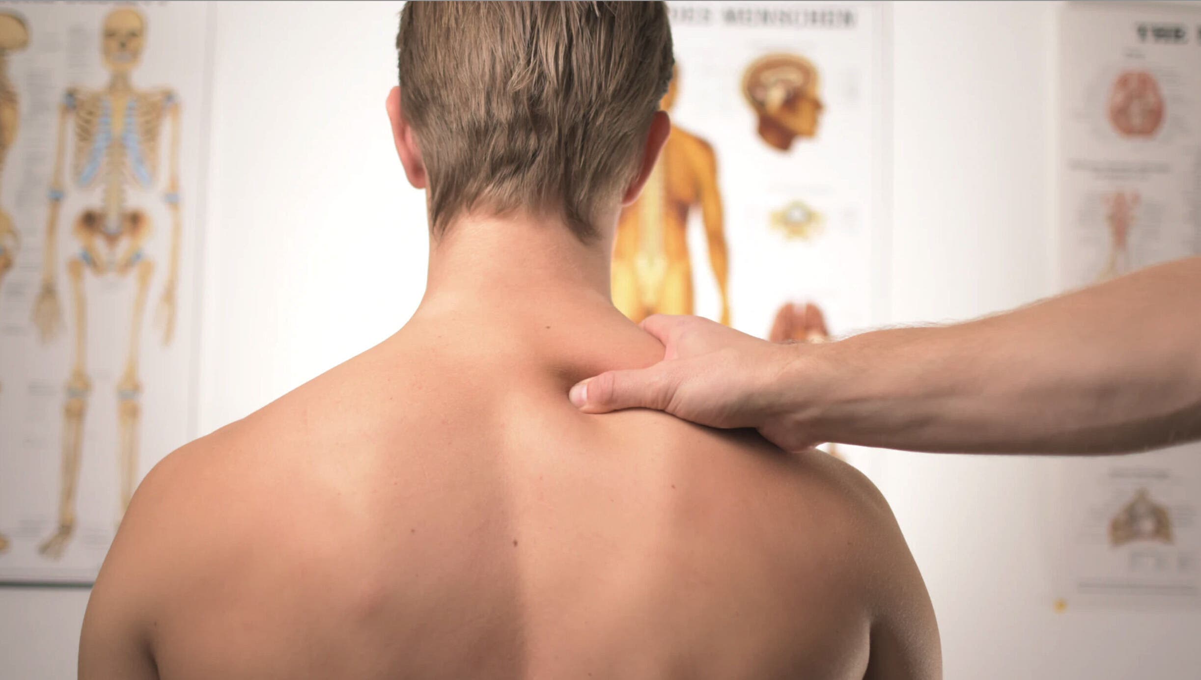 Therapist performs shoulder massage at Life Nerve Physiotherapy Center, Amman, Amman Governorate, JO.