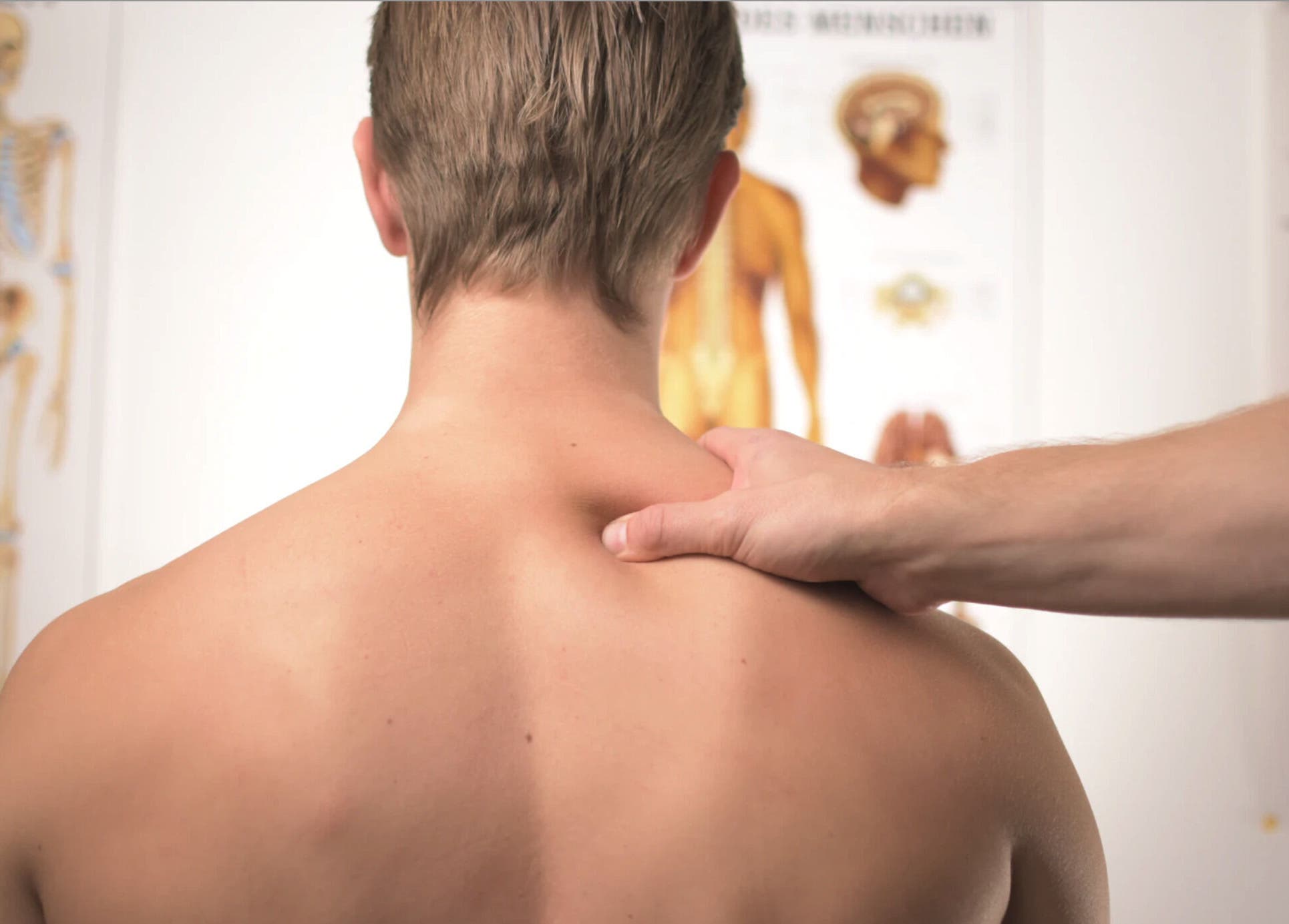 Therapist performs shoulder massage at Life Nerve Physiotherapy Center, Amman, Amman Governorate, JO.