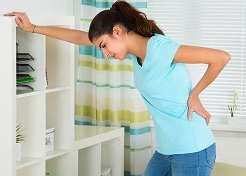 Person experiencing back pain at Life Nerve Physiotherapy Center, Amman, Amman Governorate, JO.