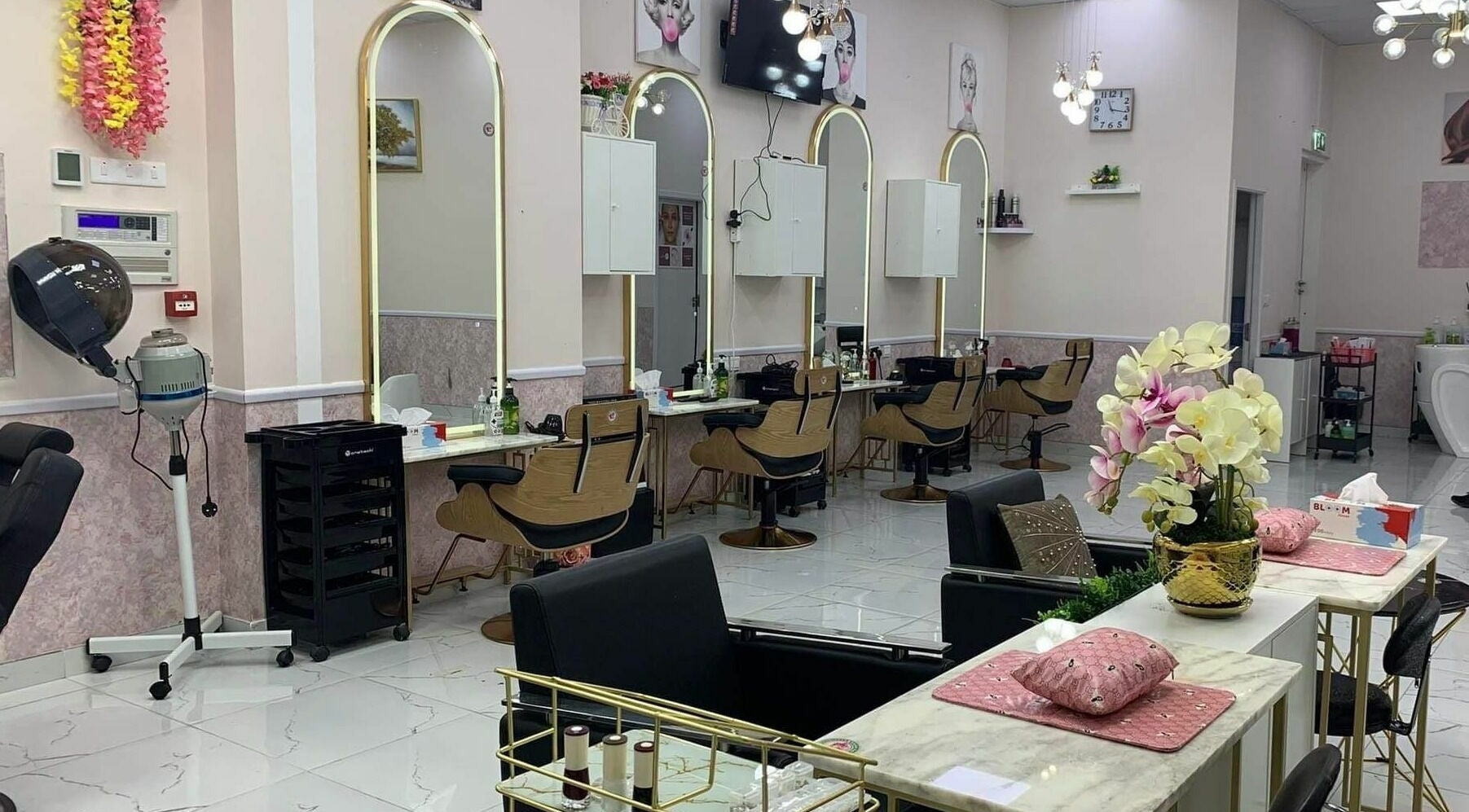 Interior of Pretty Pink Ladies Salon in Dubai, Dubai, AE, featuring stylish chairs and elegant decor.
