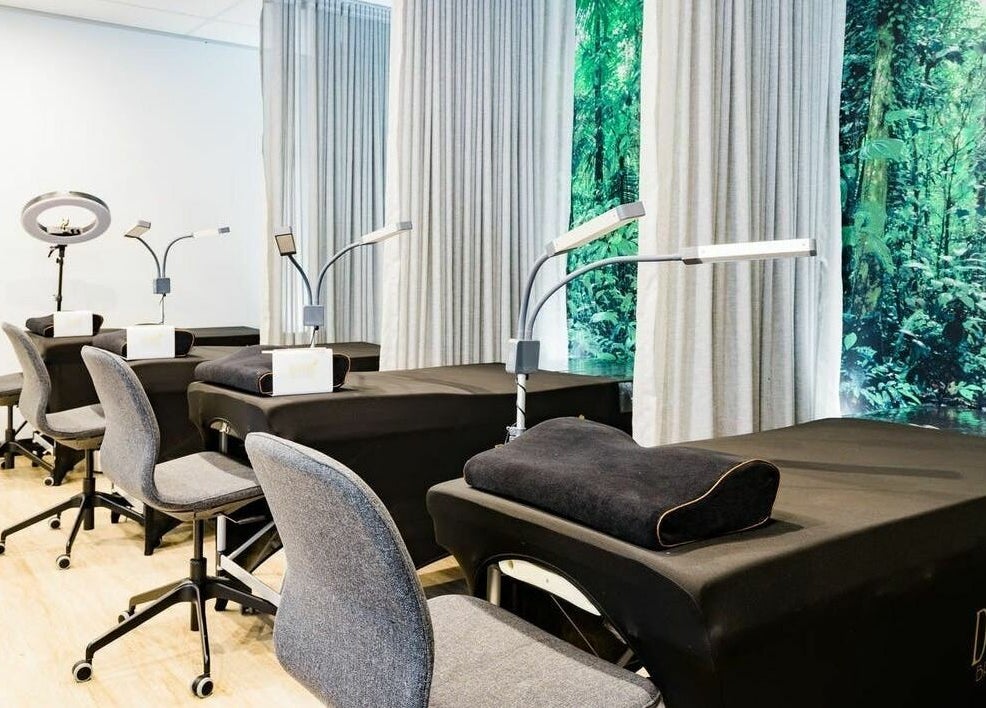 Modern treatment room at Divine Brow Lash & Skincare - Surry Hills, featuring sleek decor. Surry Hills, New South Wales, AU.