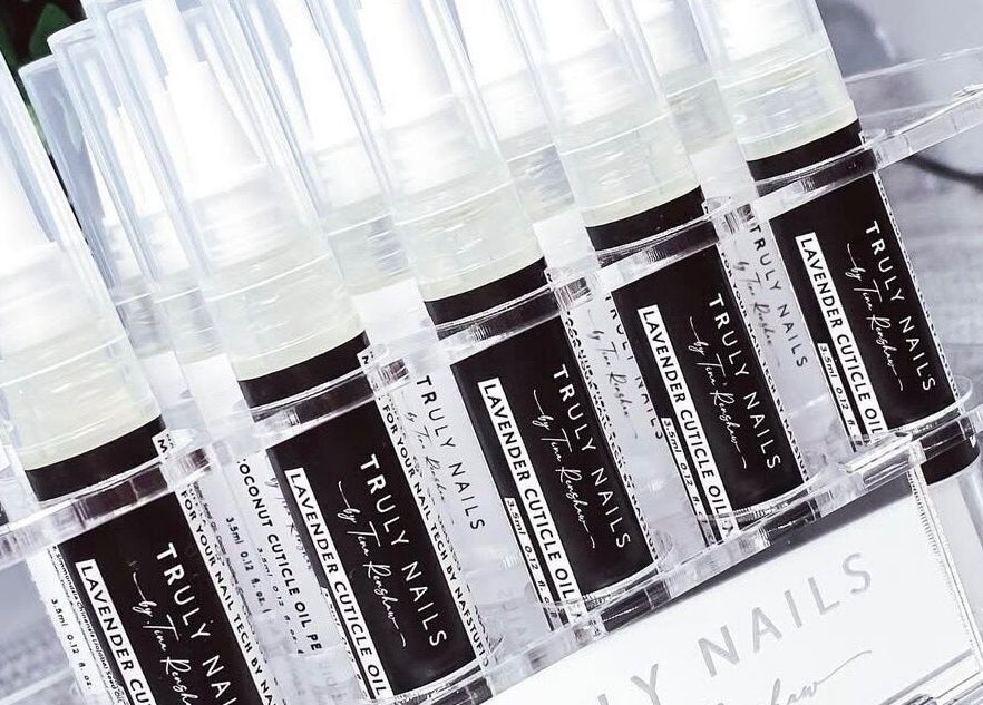 Truly Nails cuticle oils on display in Cadishead, England, GB offering premium nail care solutions.