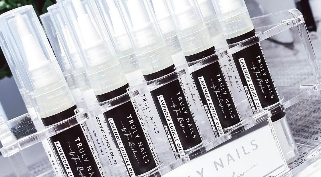 Truly Nails cuticle oils on display in Cadishead, England, GB offering premium nail care solutions.