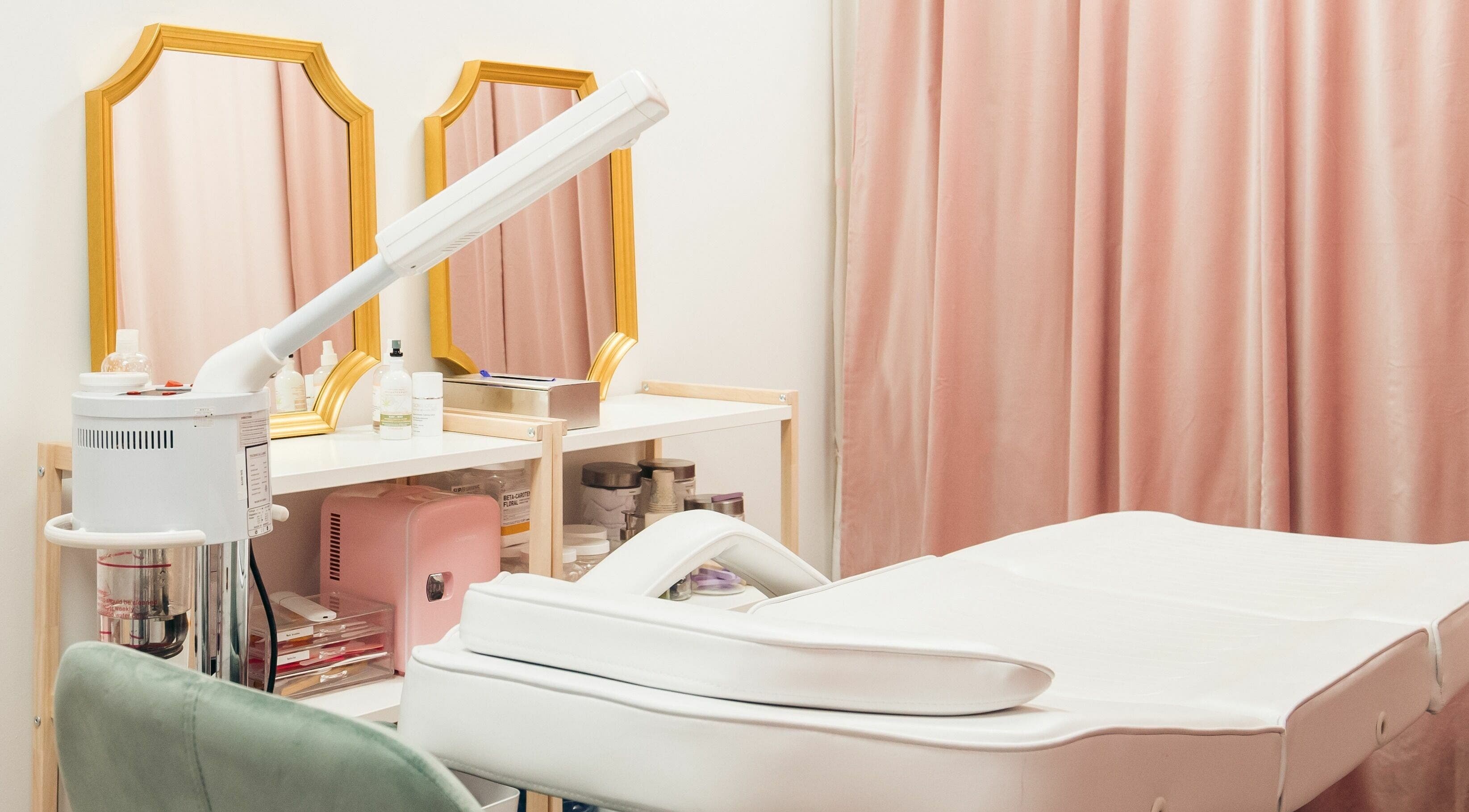 Chic treatment room at The Hive Beauty in Langley Township, British Columbia, CA with mirrors and beauty equipment.