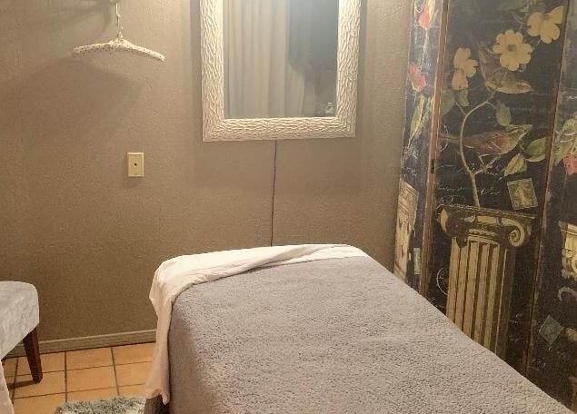 Tranquil room at Amanda Zielkle LMT 7904 in Las Cruces, New Mexico, US. Cozy massage table with artistic décor.