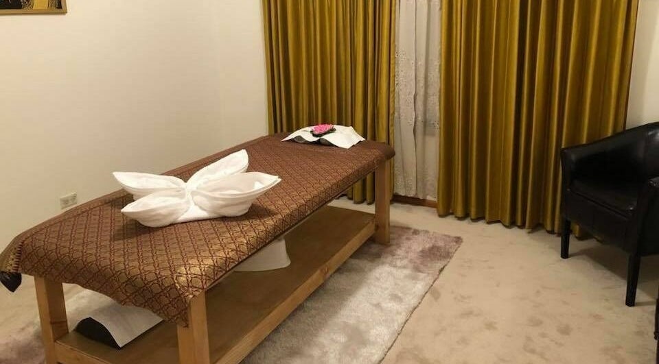 Serene massage room at Wanee Thai Massage Therapy in Melbourne, Victoria, AU with elegant decor.