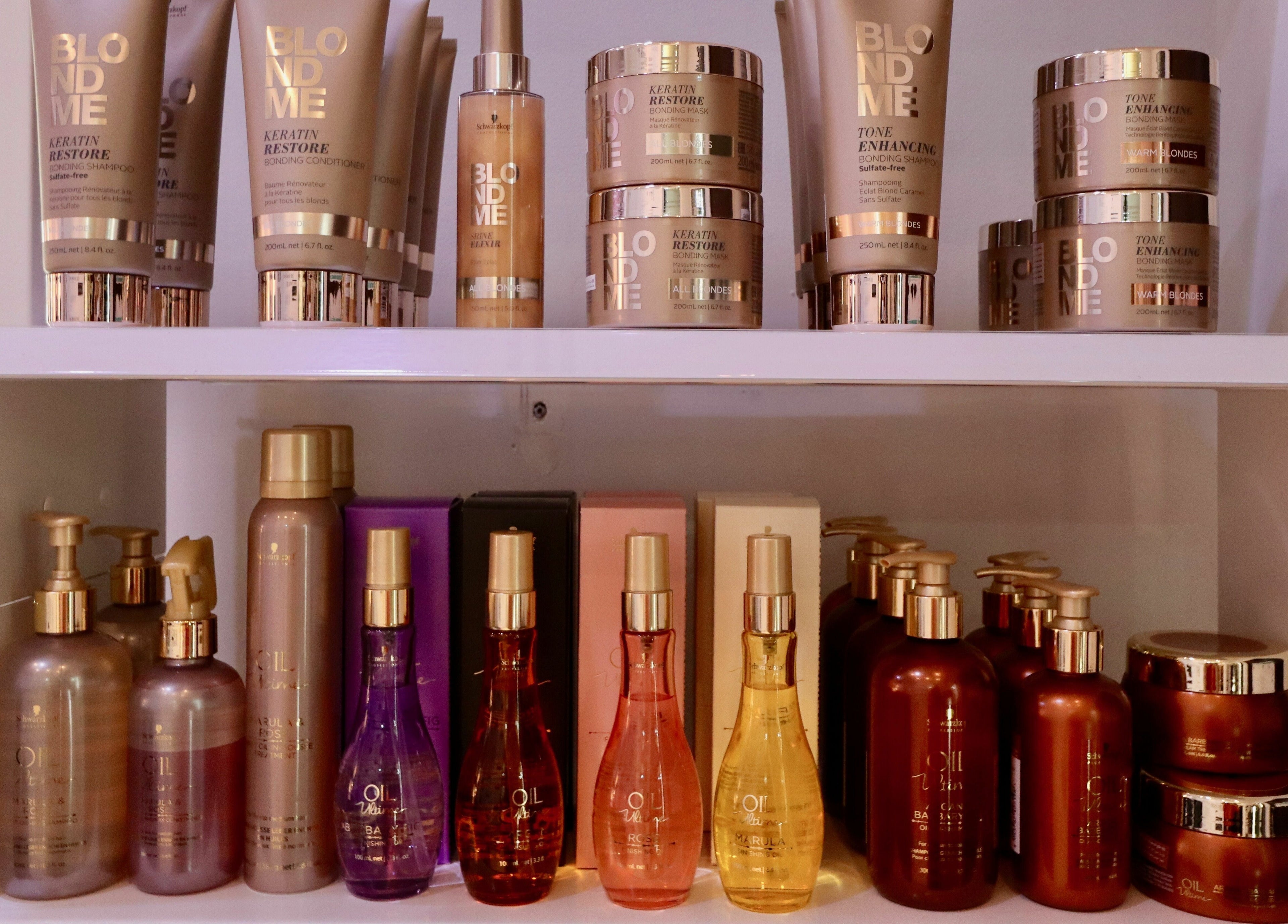 Premium haircare products at Robert Alexander Salon, Dubai, Dubai, AE, beautifully displayed on shelves.